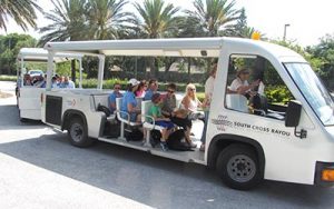 people on a tour tram at South Cross Bayou