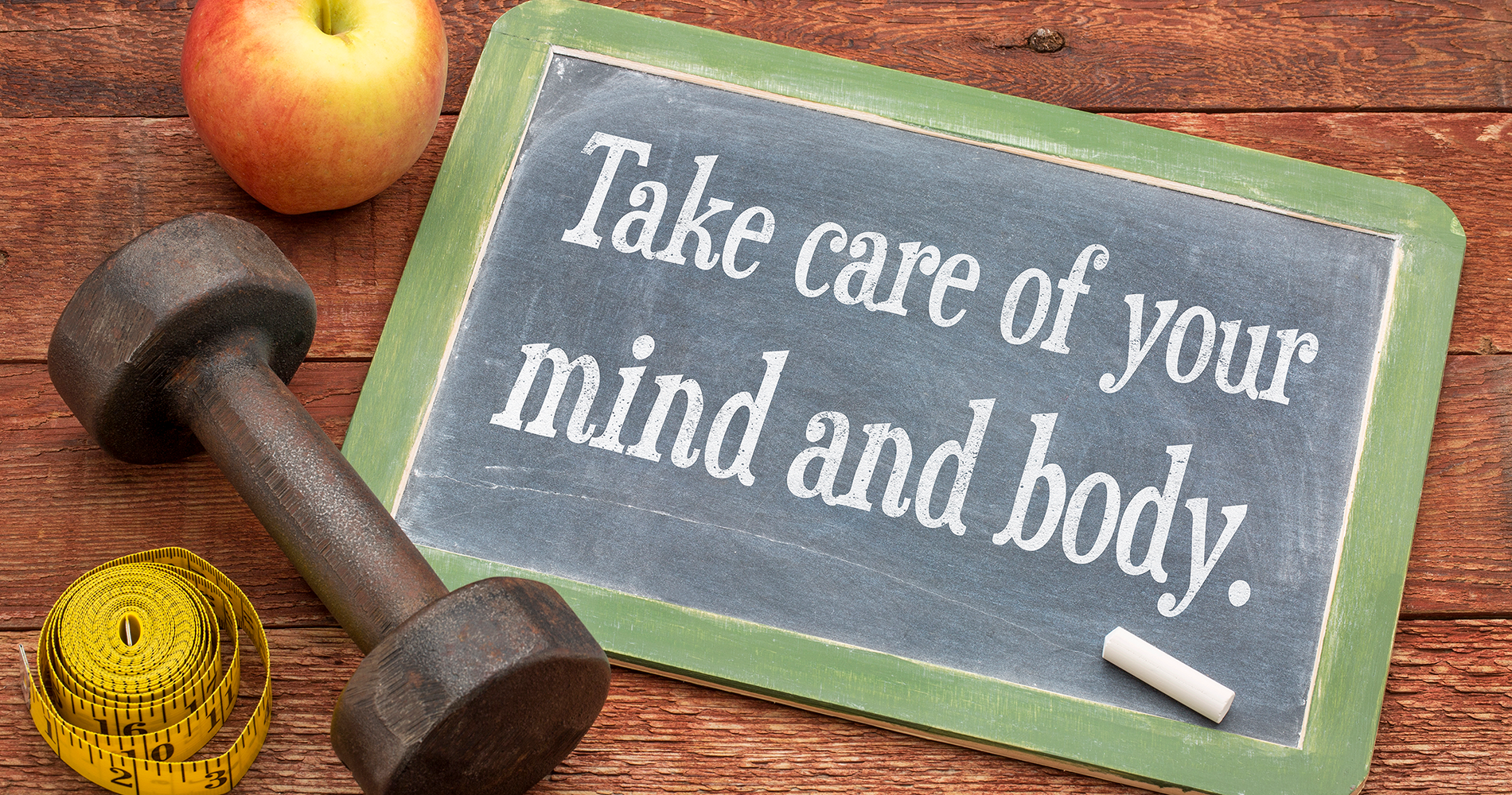 Take care of your mind and body words on a chalkboard