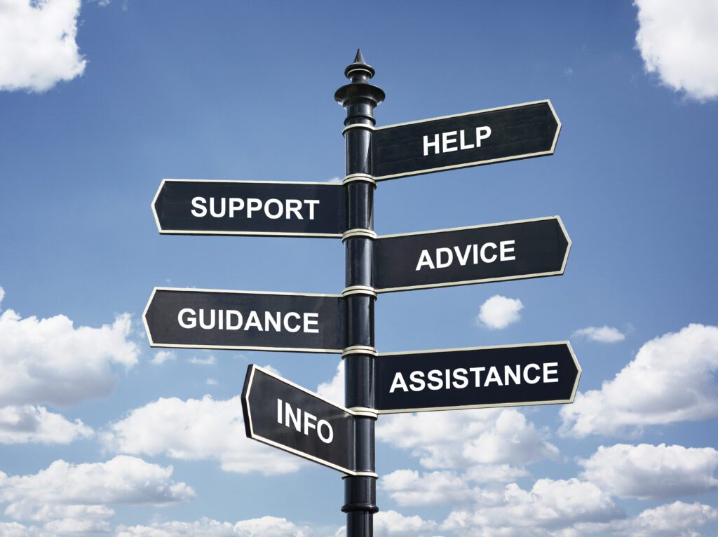 Help, support, advice, guidance, assistance and info crossroad sign post