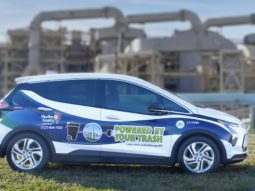 Electric Chevrolet Bolt vehicle parked in front of Pinellas County's Solid Waste Disposal Complex