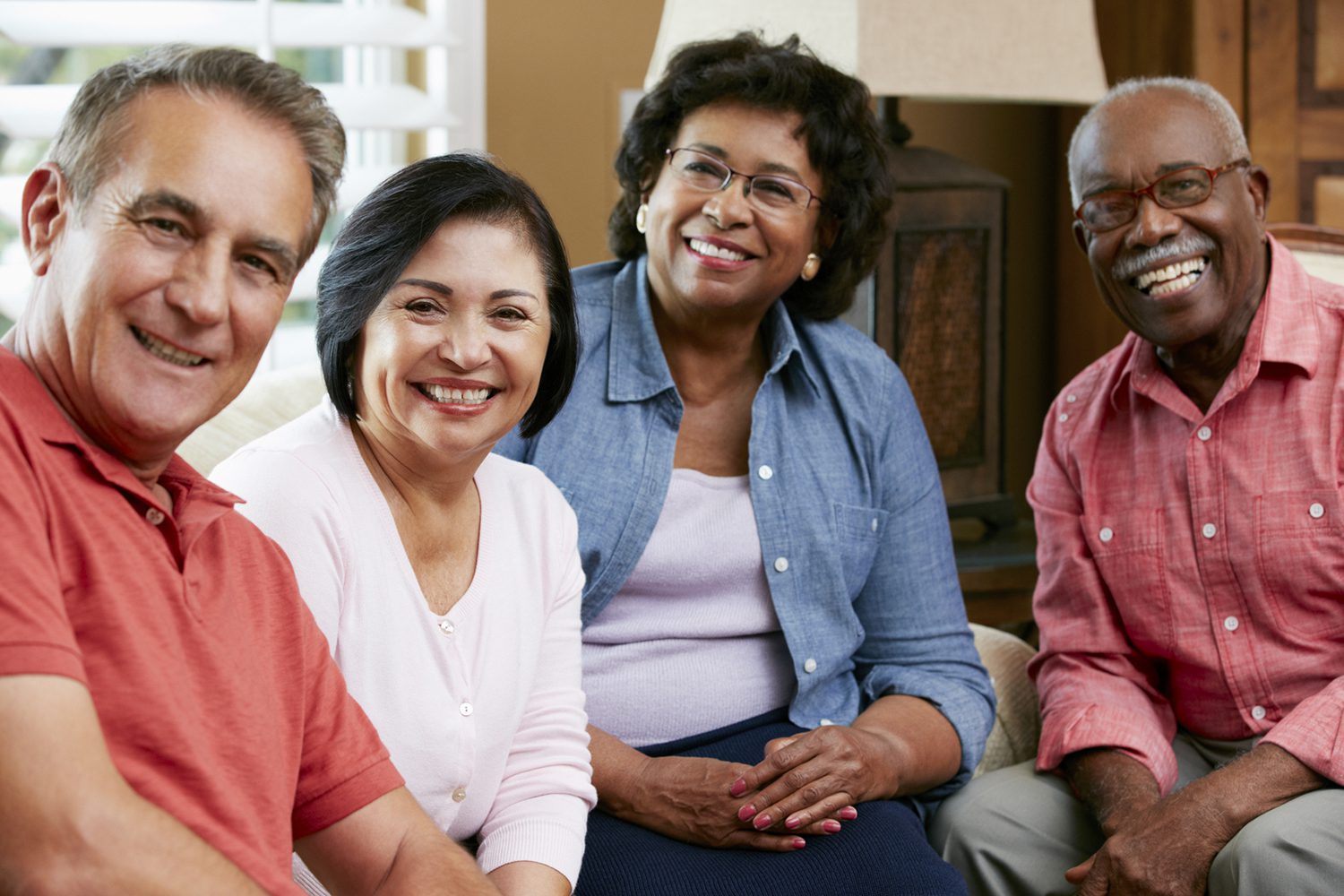 Portrait of Friends At Home Together Smiling