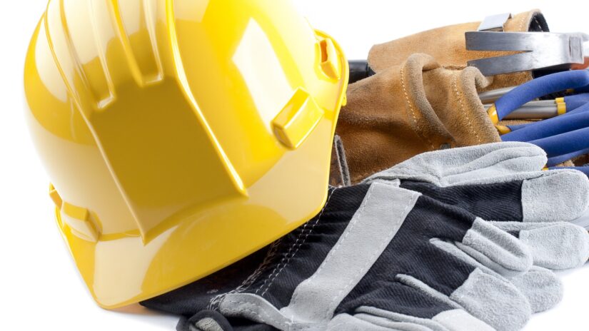 Construction hard hat, gloves and tool belt
