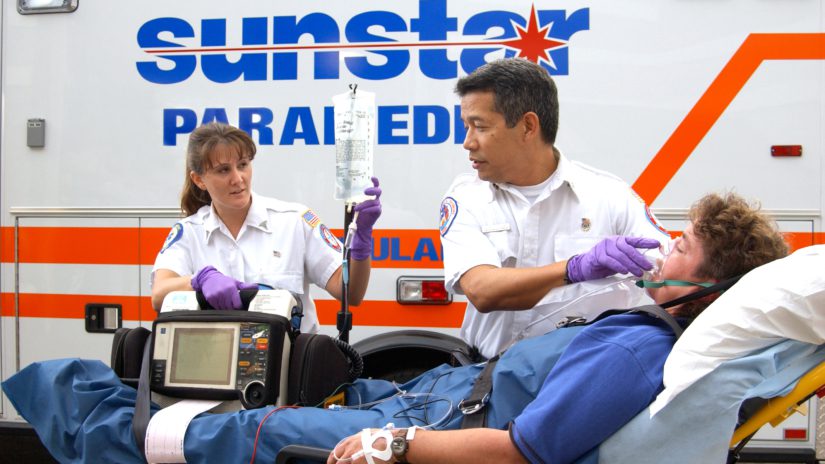 First responders assist an ambulance patient