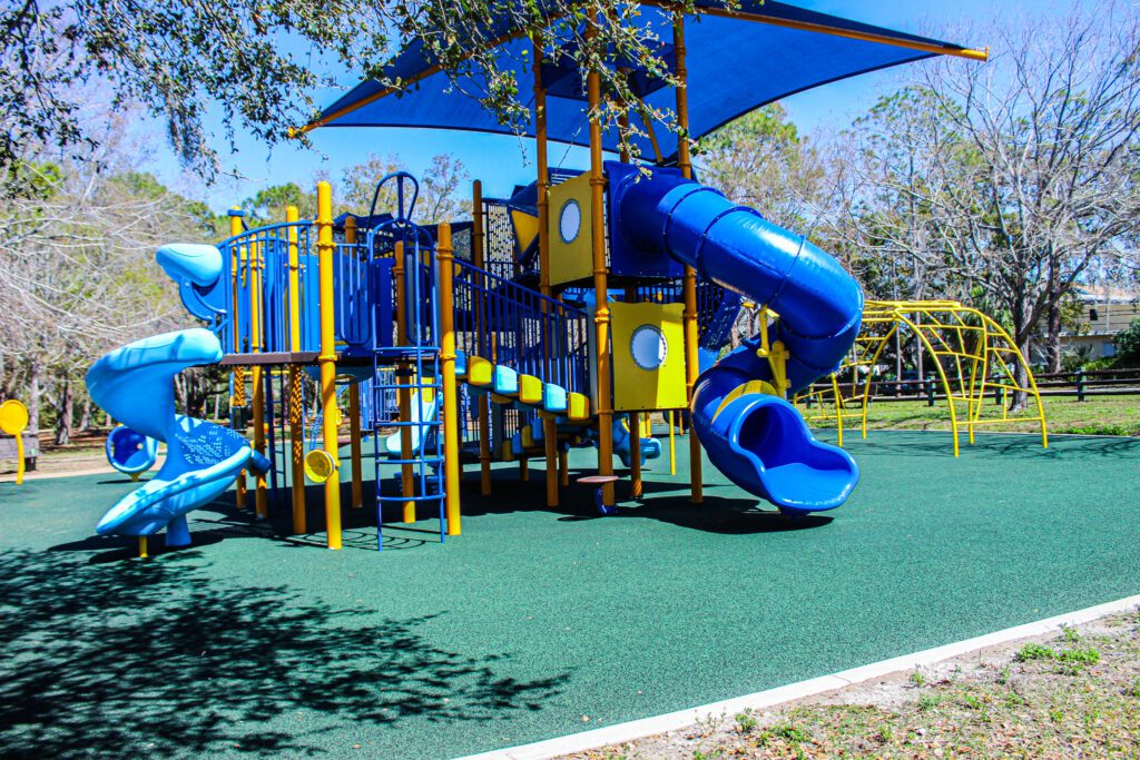Slides and climbing area at Taylor Park's new playground built in 2024
