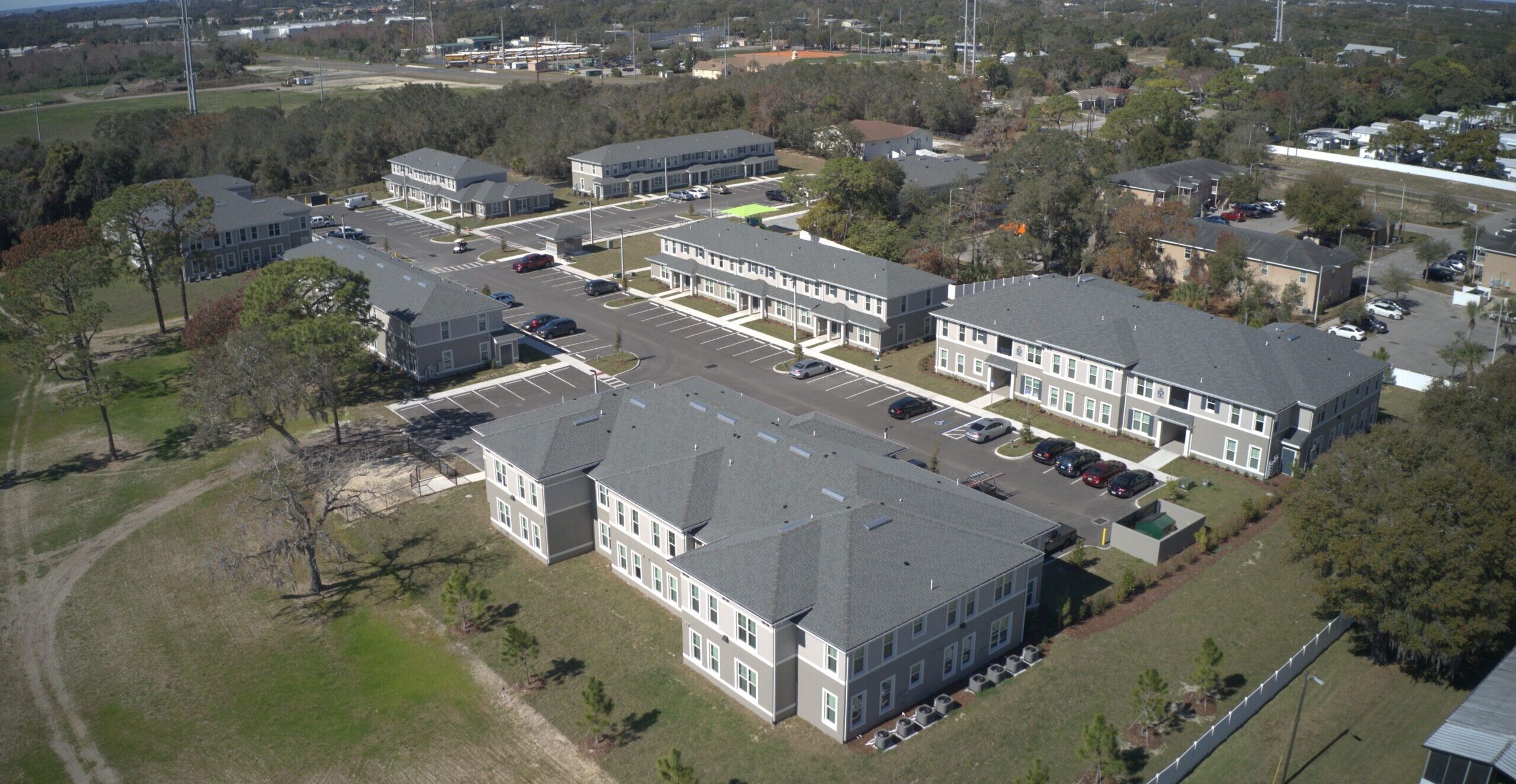 Aerial photo of apartment building and surrounding neighborhoods