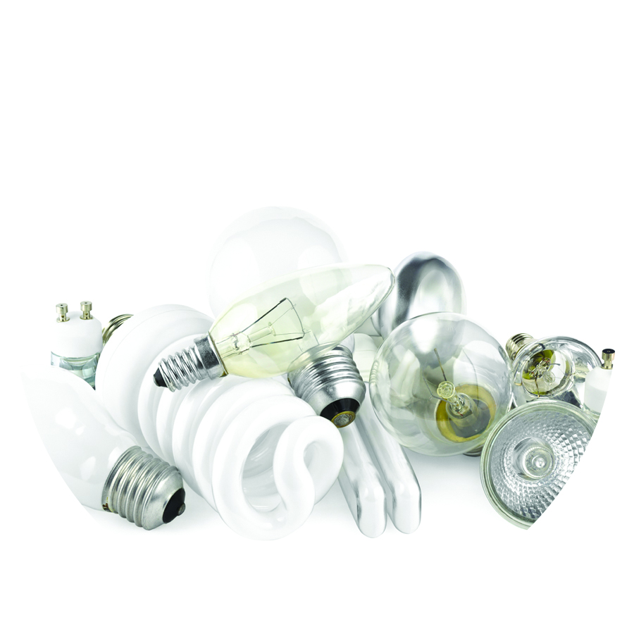 Mixed heap of light bulbs with filament bulbs and energy salving lamps