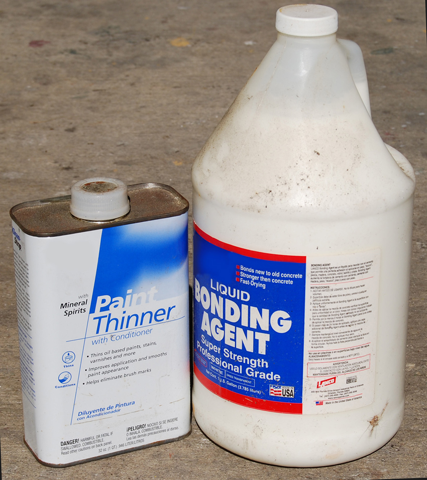 can of paint thinner and bottle of bonding agent