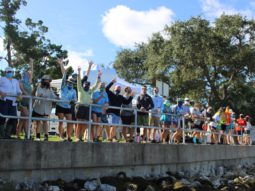 volunteers lined up and waving on living shoreline installation day in Ozona
