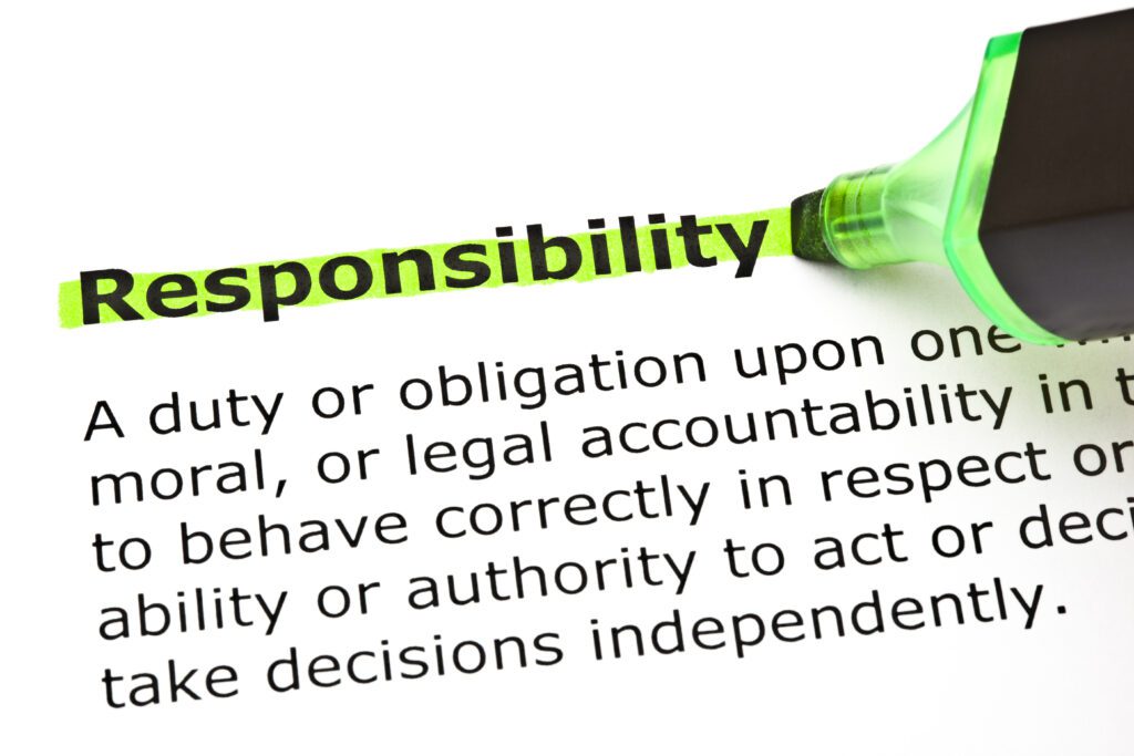 Definition of the word Responsibility highlighted in green with felt tip pen
