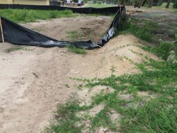 improperly installed silt fencing