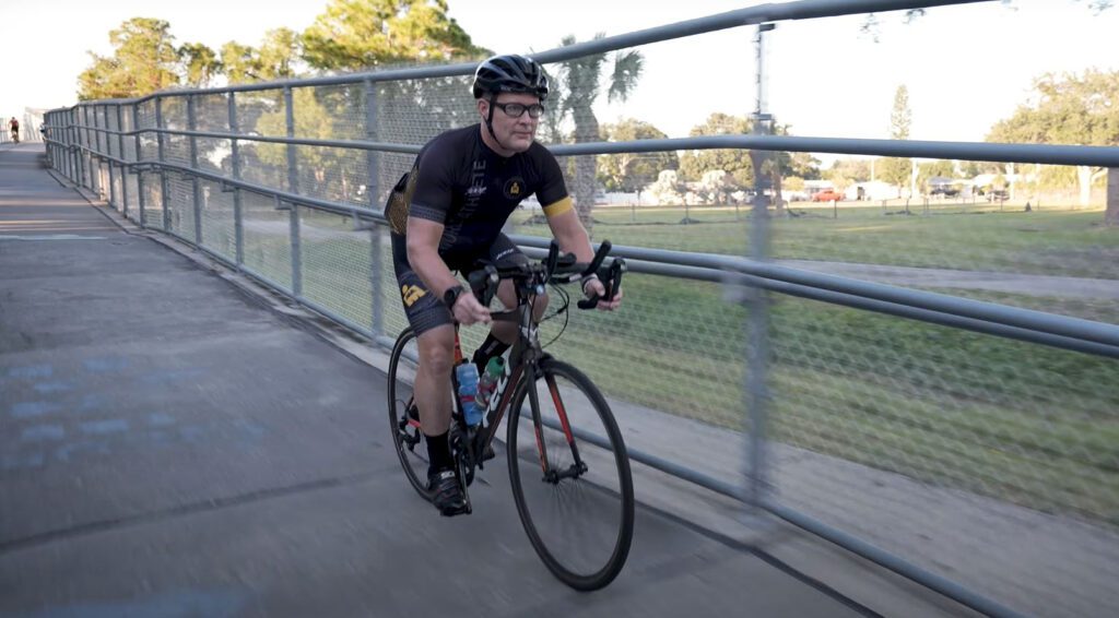 Cyclist biking on the Pinellas Trail