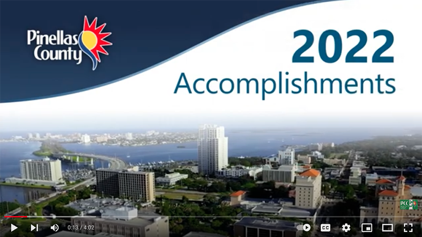 The opening screen from the Pinellas County 2022 Accomplishments Report video showing the county logo, the words "2022 Accomplishments" and an aerial view of the City of Clearwater looking toward Clearwater Beach.
