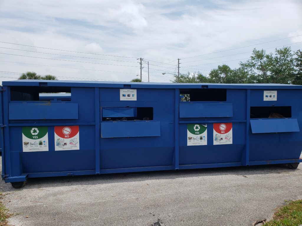 Image of a recycling drop-off center container 