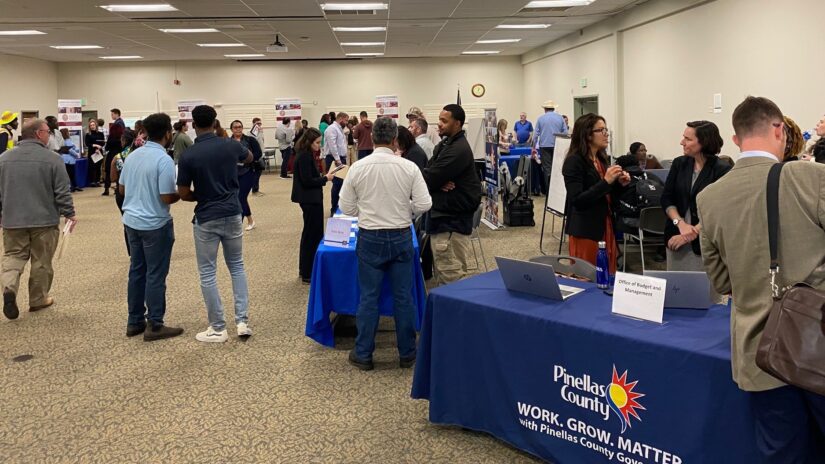 People inside a room at a previous Pinellas County career fair.