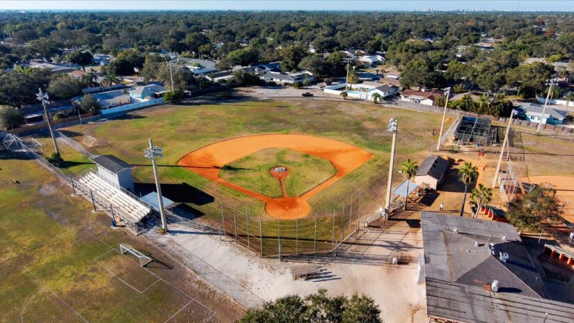 Aerial view of baseball field with warn and dead turf.