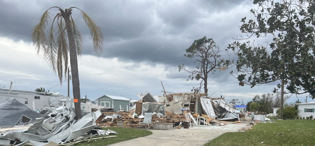 Photo of mobile homes collapsed.