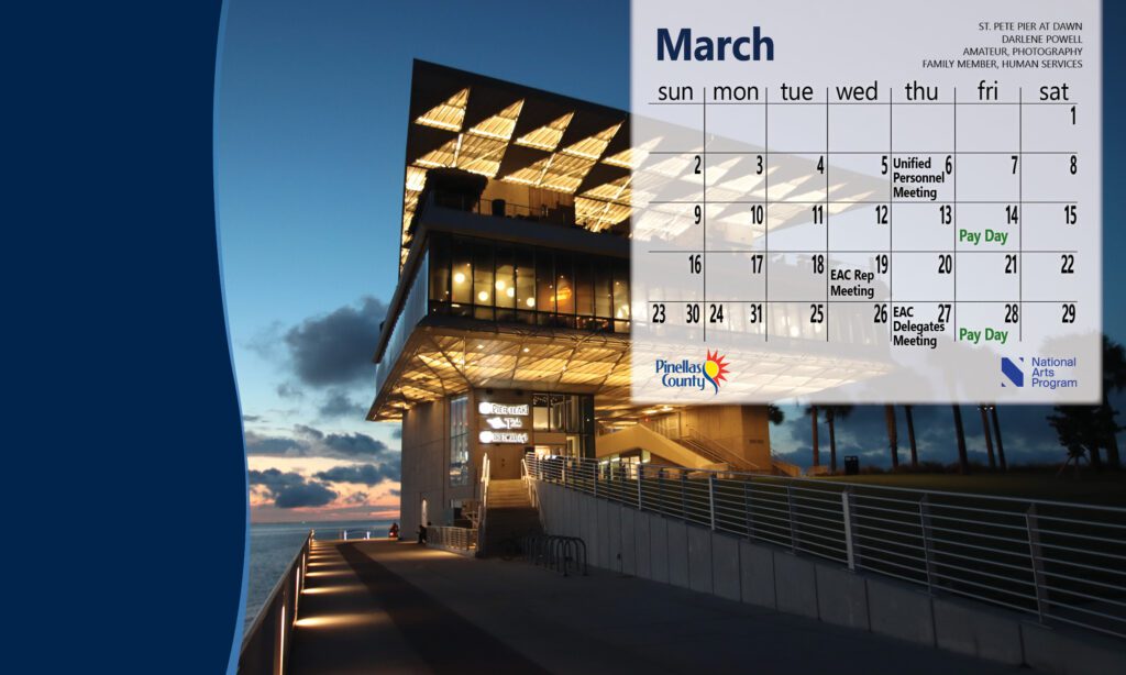 Desktop calendar for March 2025 with photo of St. Pete Pier at dawn