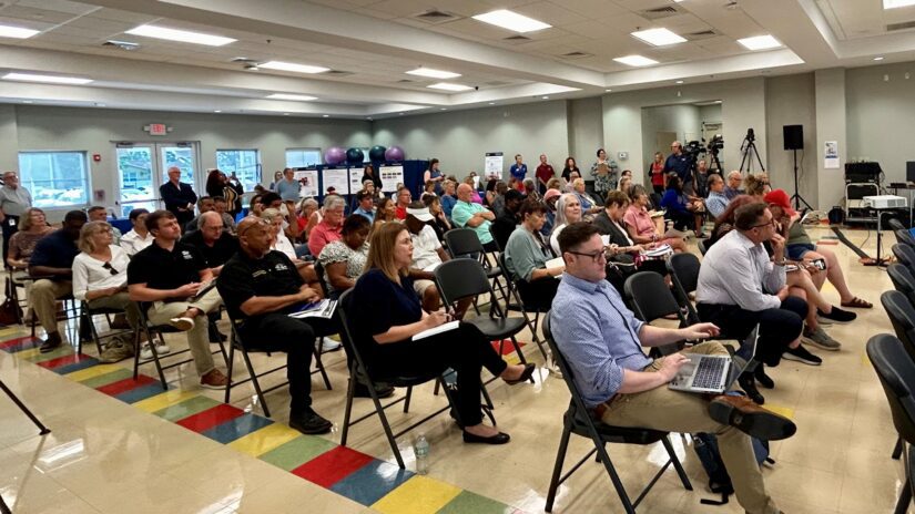 Photo of people seated at a public meeting at the Lealman Exchange on April 7, 2025, during a public meeting.