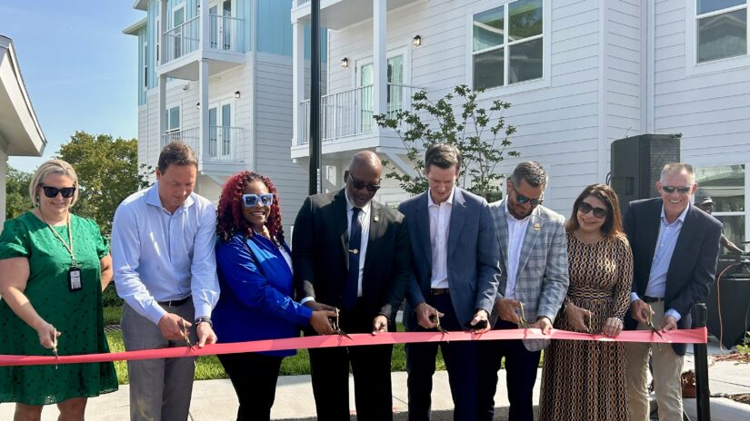 Officials from Pinellas County, City of St. Petersburg and Gravel Road Development cut the ribbon on new affordable apartments at Bayou Court Apartments.