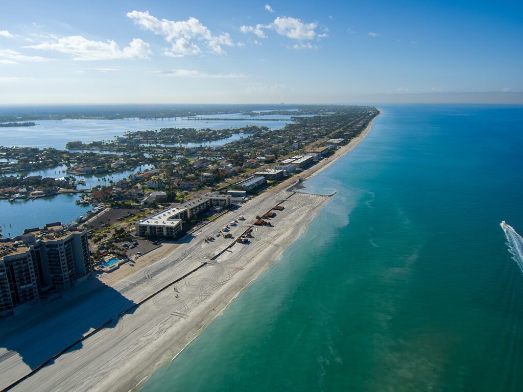 Sand Key beach showing the increased expanse of sand between beach that has been renourished and beach that has not.