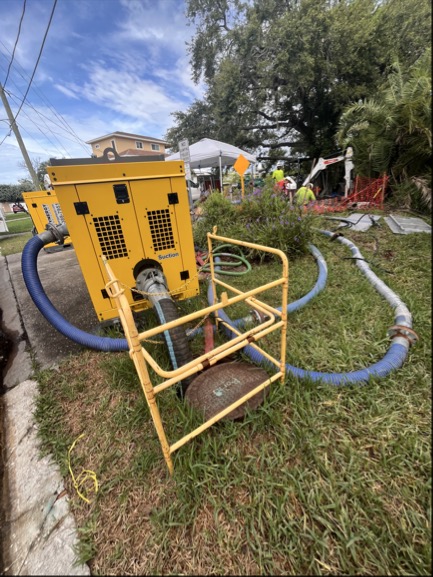 A bypass wastewater pump sits at the corner of Oakhurst Dr. and Bayshore Dr. while Pinellas County Utilities crewmembers work to replace the wastewater pump station, August 2025.