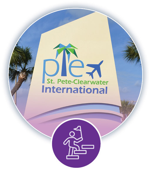 St. Pete Clearwater International airport sign and purple travel icon