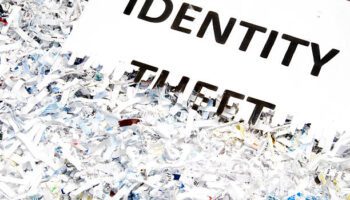 Identity Theft typed on a shredded piece of paper.