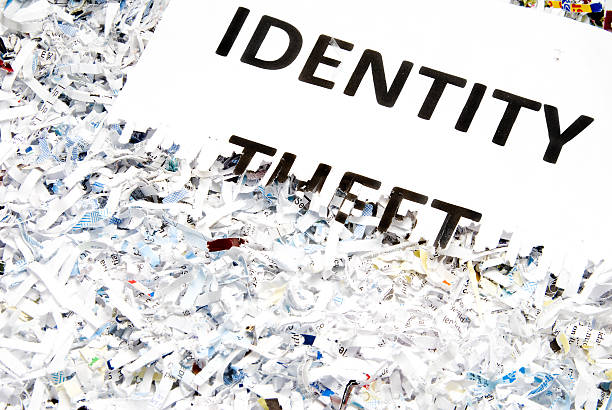 Identity Theft typed on a shredded piece of paper.