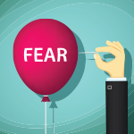 illustration of a hand using a long pin to pop a balloon labeled FEAR