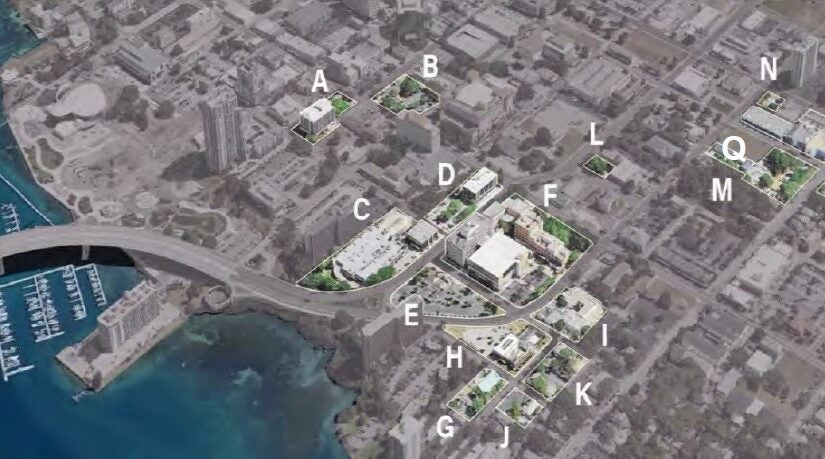 An aerial view of downtown Clearwater with 17 properties highlighted and labeled A through Q. Most are located in the core of downtown within blocks of the water.