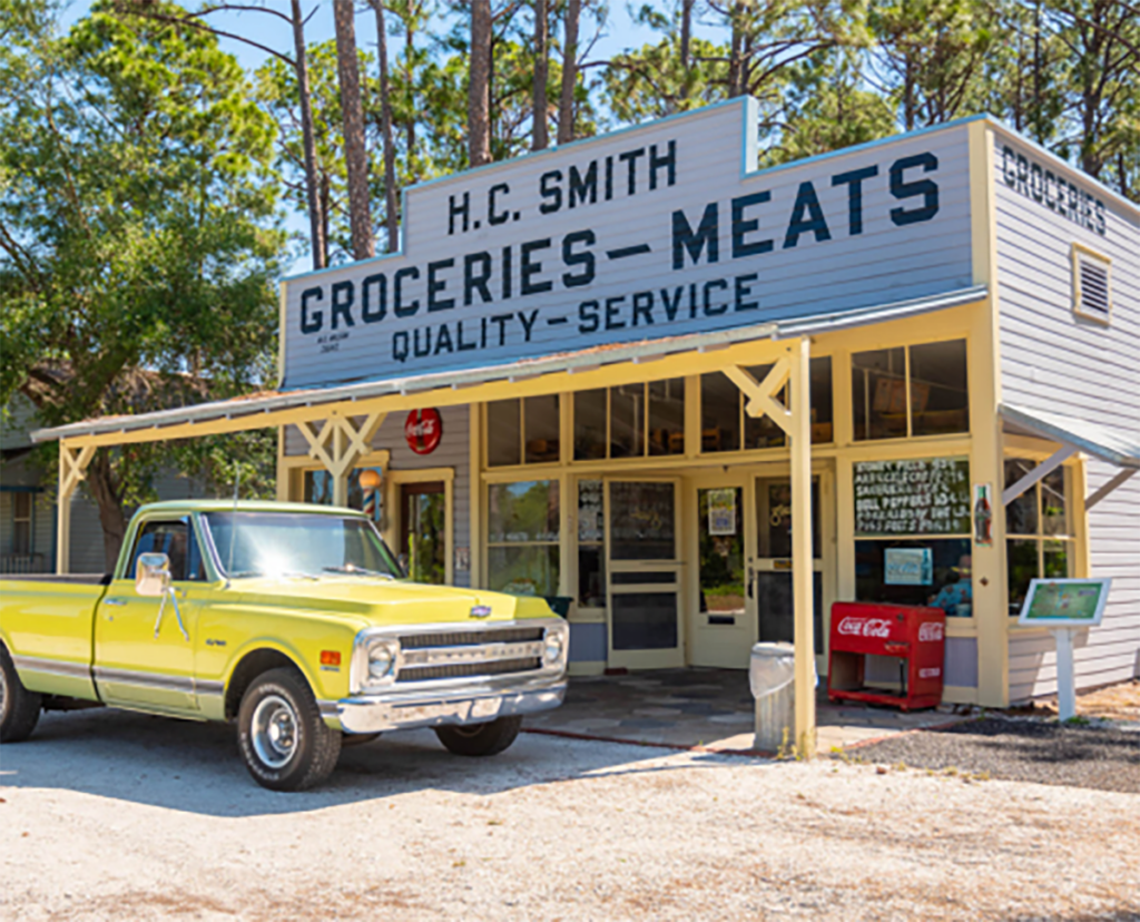 Yellow truck in front of H.C. Smith Store at Heritage Village.