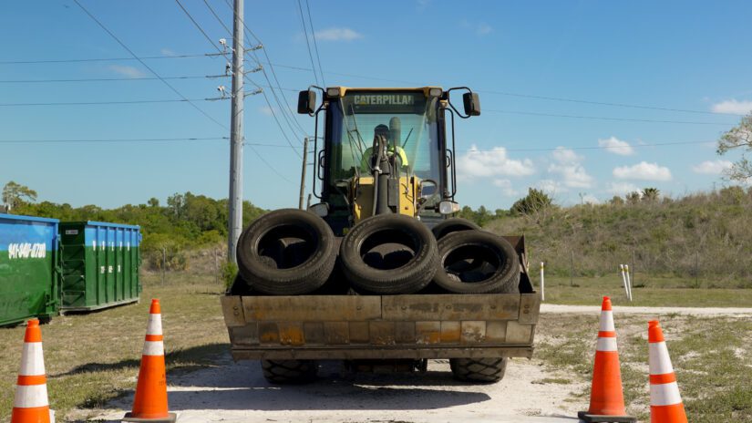 Image of a front loader with tires.