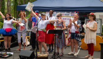 Pinellas County staff, partners and volunteers read the Declaration of Independence during the All American 50 at 250 Bash at Heritage Village in Largo.