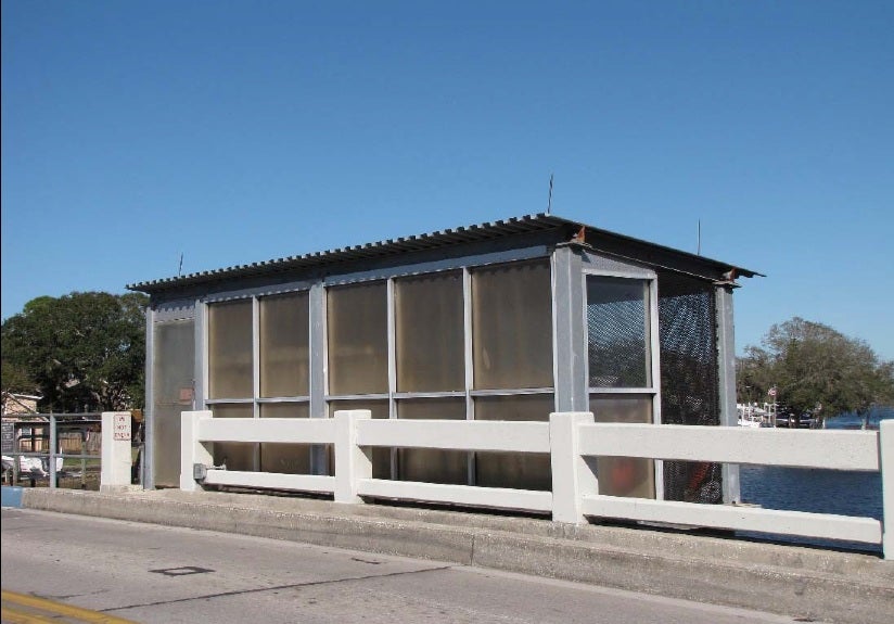 Non-historic tender station and historic concrete railings, facing northwest (Photo by Diane Kloetzer, 2017)